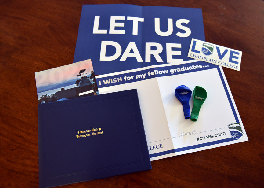 Props included in the Champlain 2020 Graduates box for Virtual Commencement: signs, balloons, and stickers
